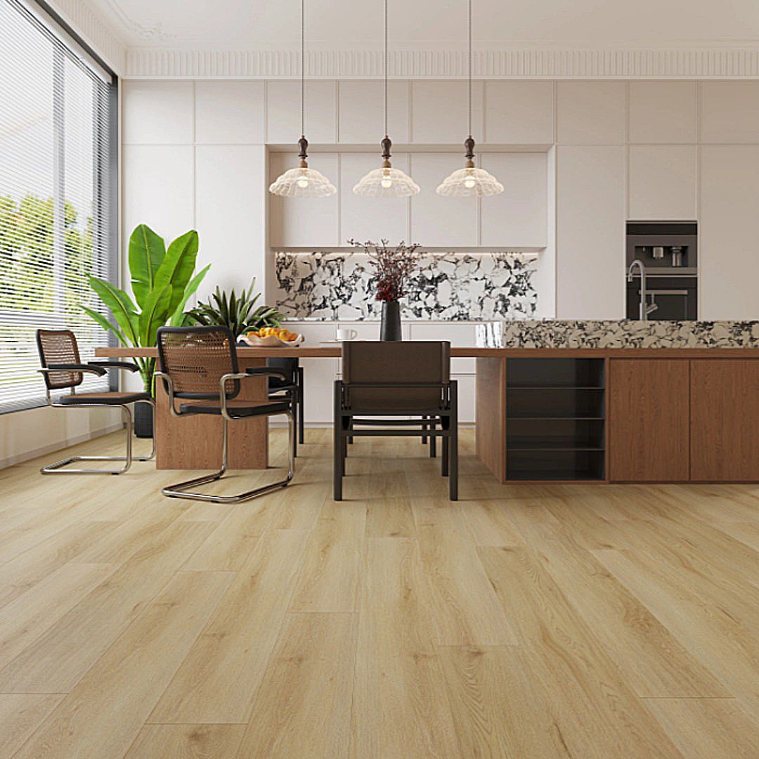 Modern kitchen featuring a wooden dining table, minimalist chairs, three pendant lights, and light-toned hardwood floors.