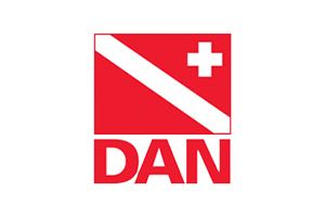 Red DAN logo with white diagonal stripe and white cross in a red square
