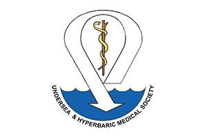 University & Hyperbaric Medical Society logo with blue wave and gold medical symbol