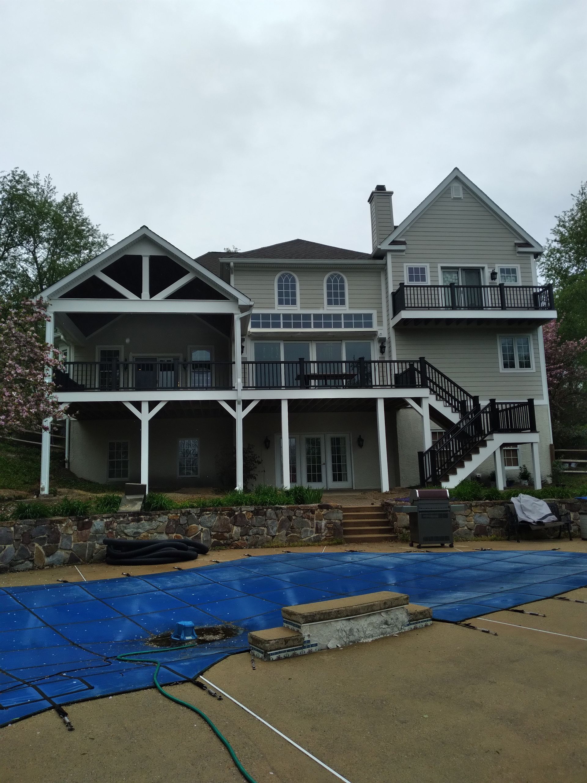 A large house with a beautiful deck