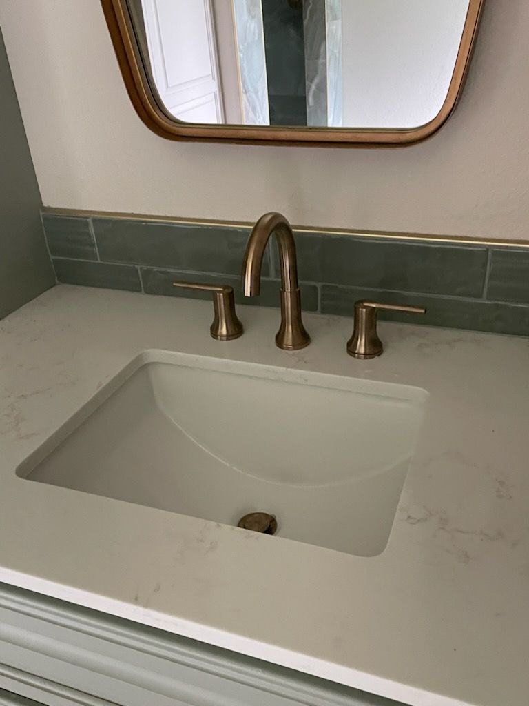 A sink with a square basin