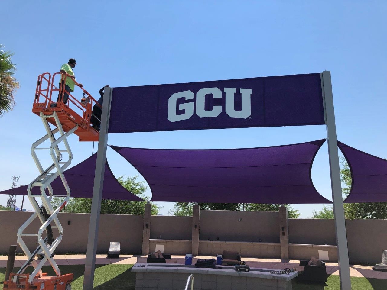 A purple sign that says gcu on it