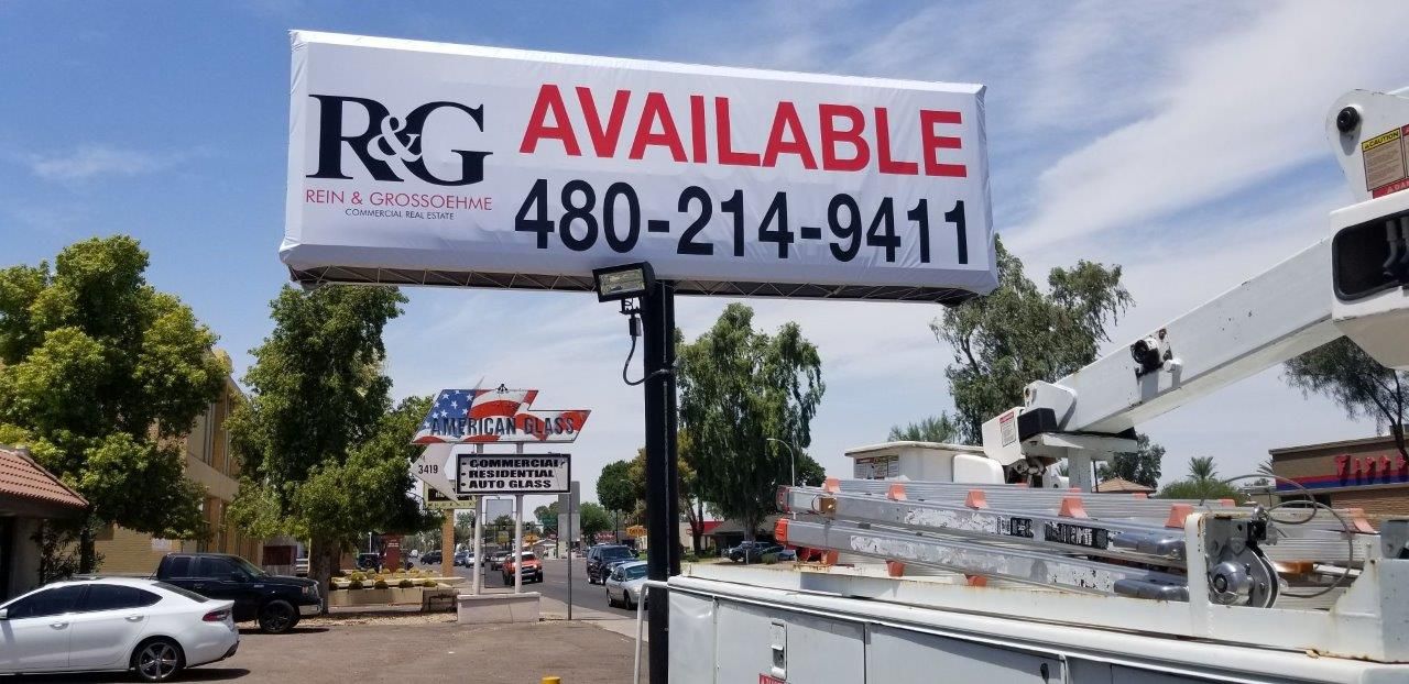 A billboard that says rg available on it