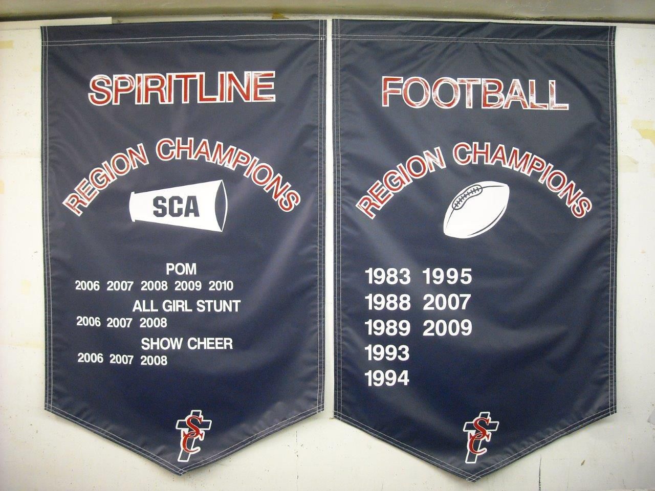 Two banners that say spiritline football on them