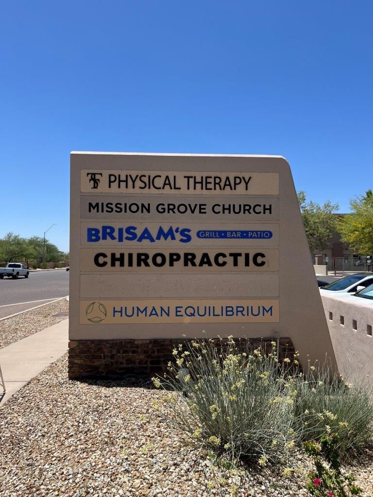 A sign for physical therapy mission grove church brisam 's chiropractic and human equilibrium