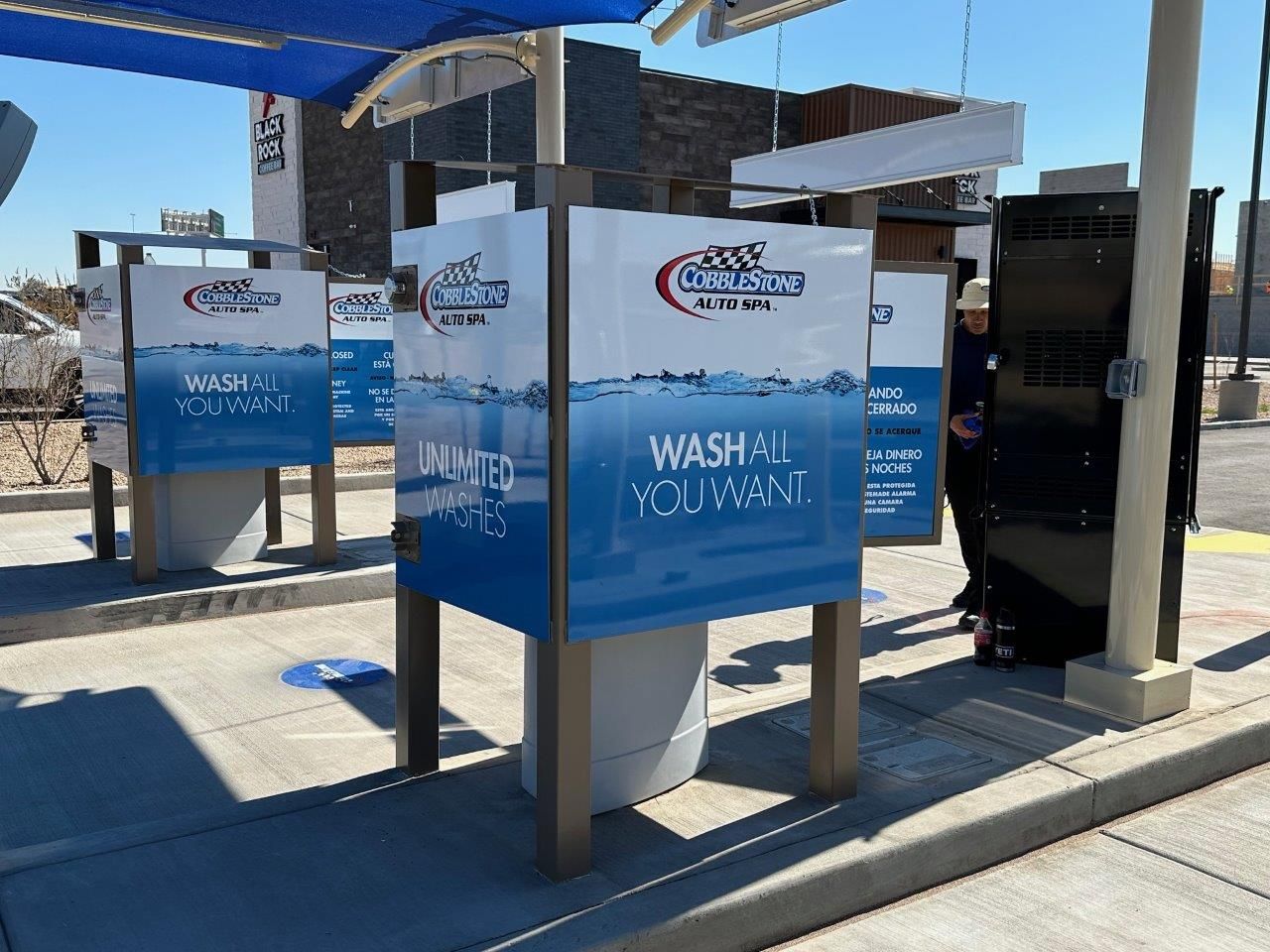 A car wash with a sign that says