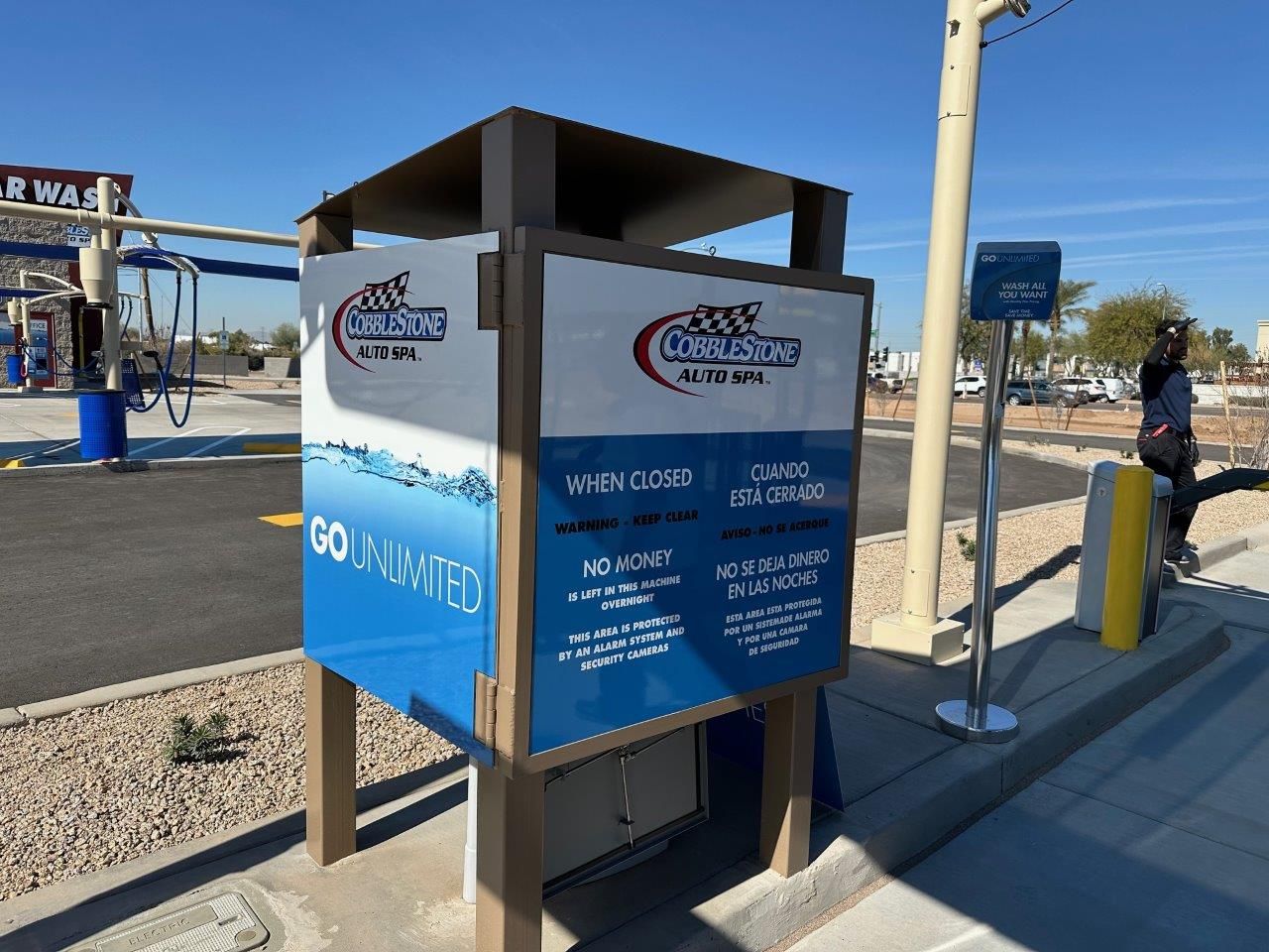 A car wash with a sign that says go minutes on it.