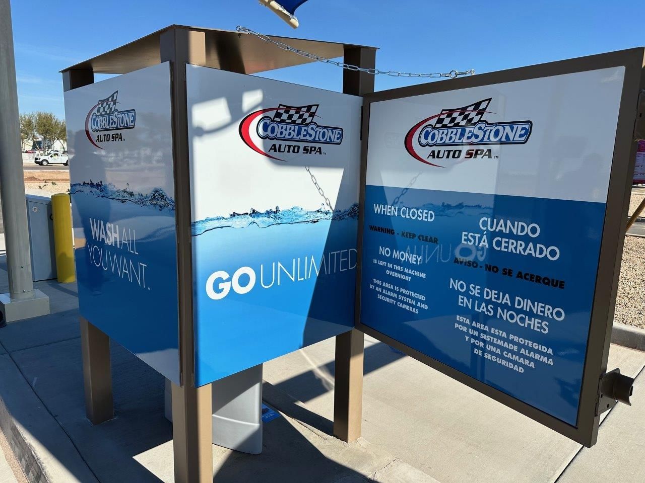A couple of signs that say go unlimited on them