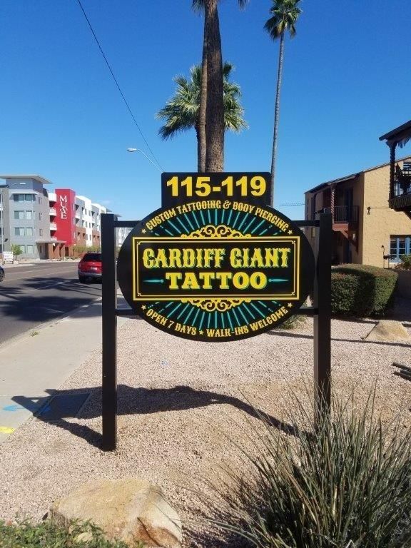 A sign that says garduff giant tattoo on it