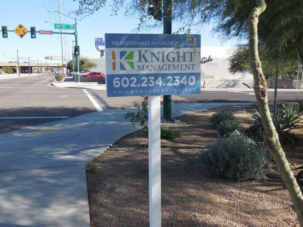 A sign that says knight management on it