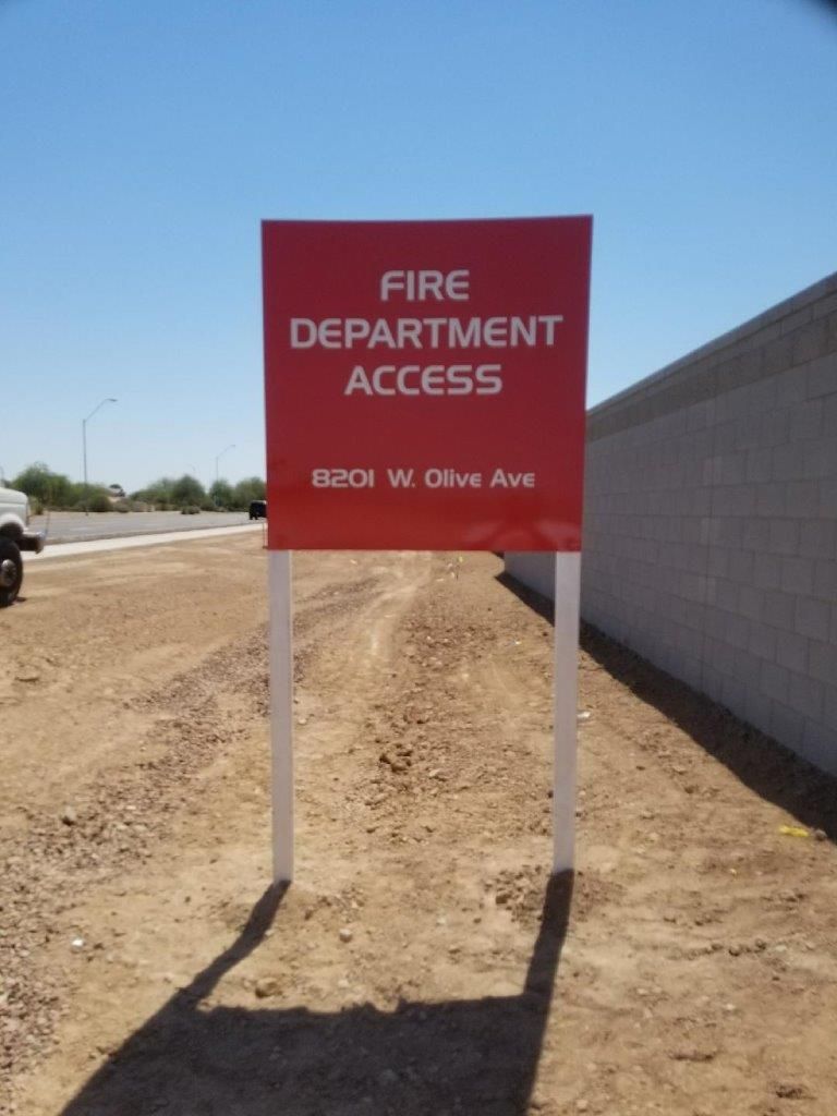 A red sign that says fire department access on it