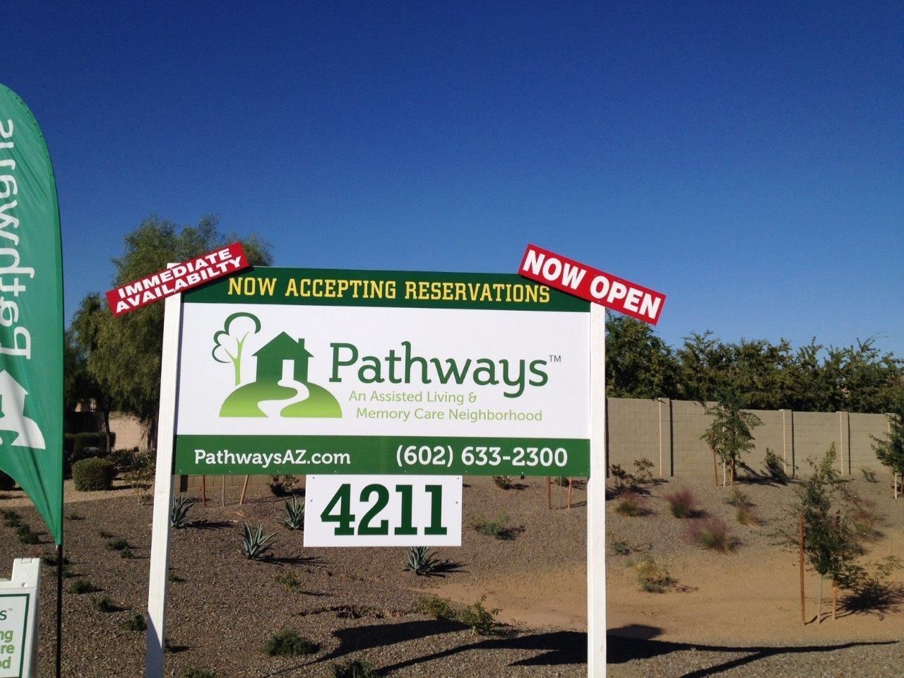 A sign for pathways says now accepting reservations