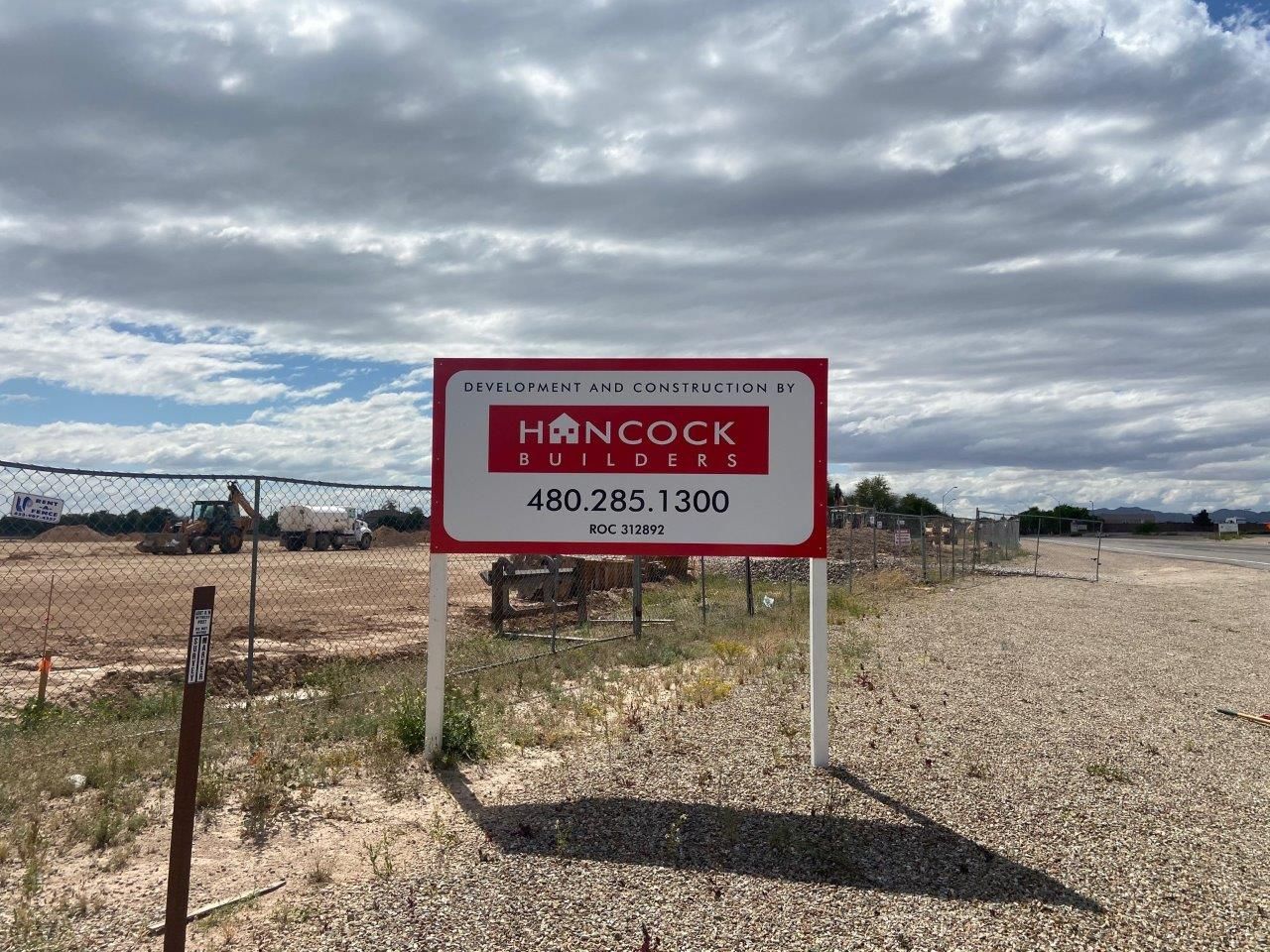 A sign that says hancock buildings on it