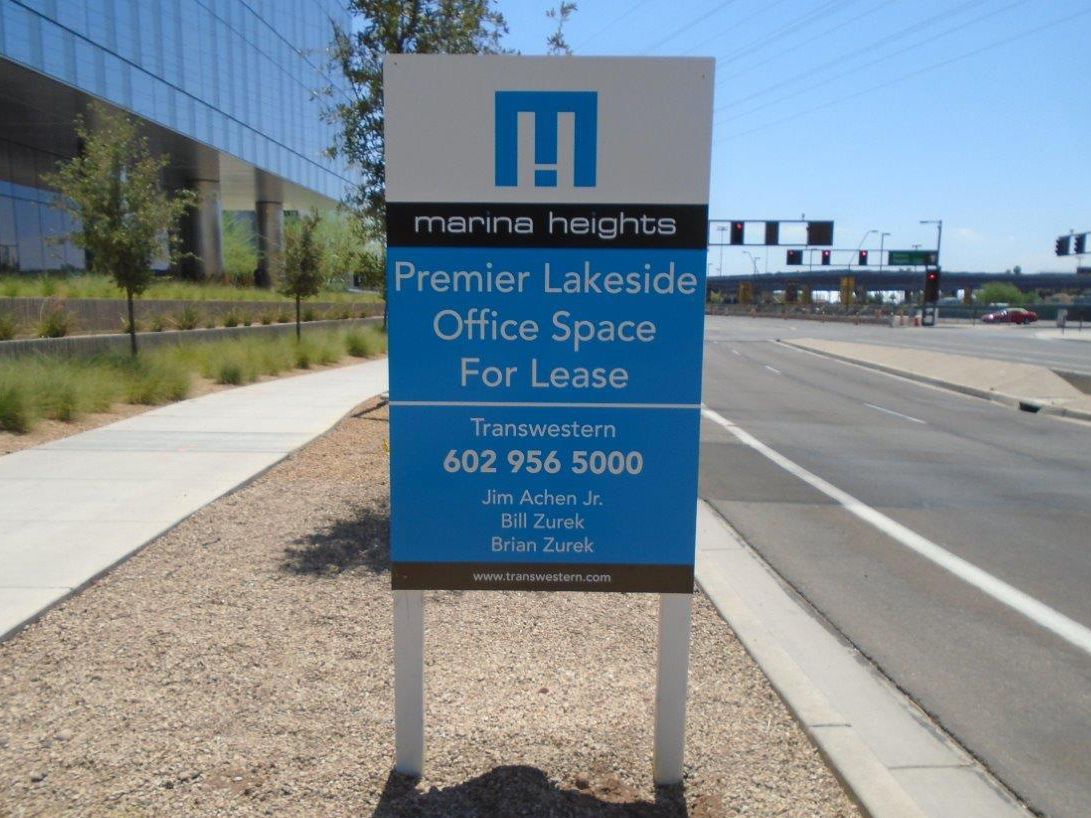 A sign for premier lakeside office space for lease