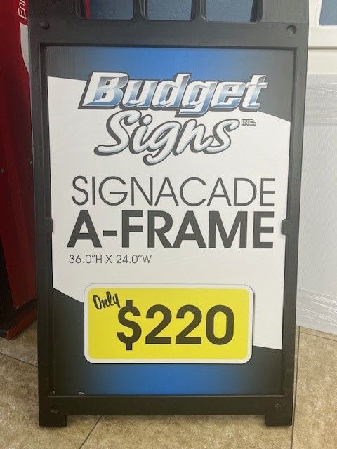 a sign that says budget signs on it