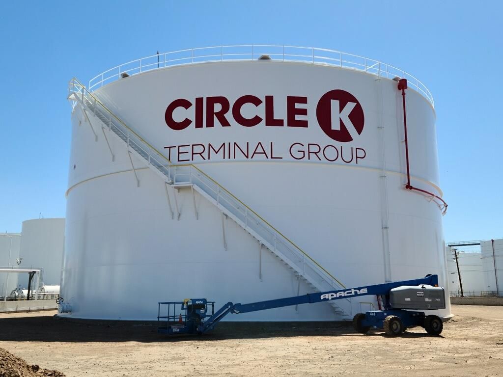 A large white tank with circle k terminal group written on it
