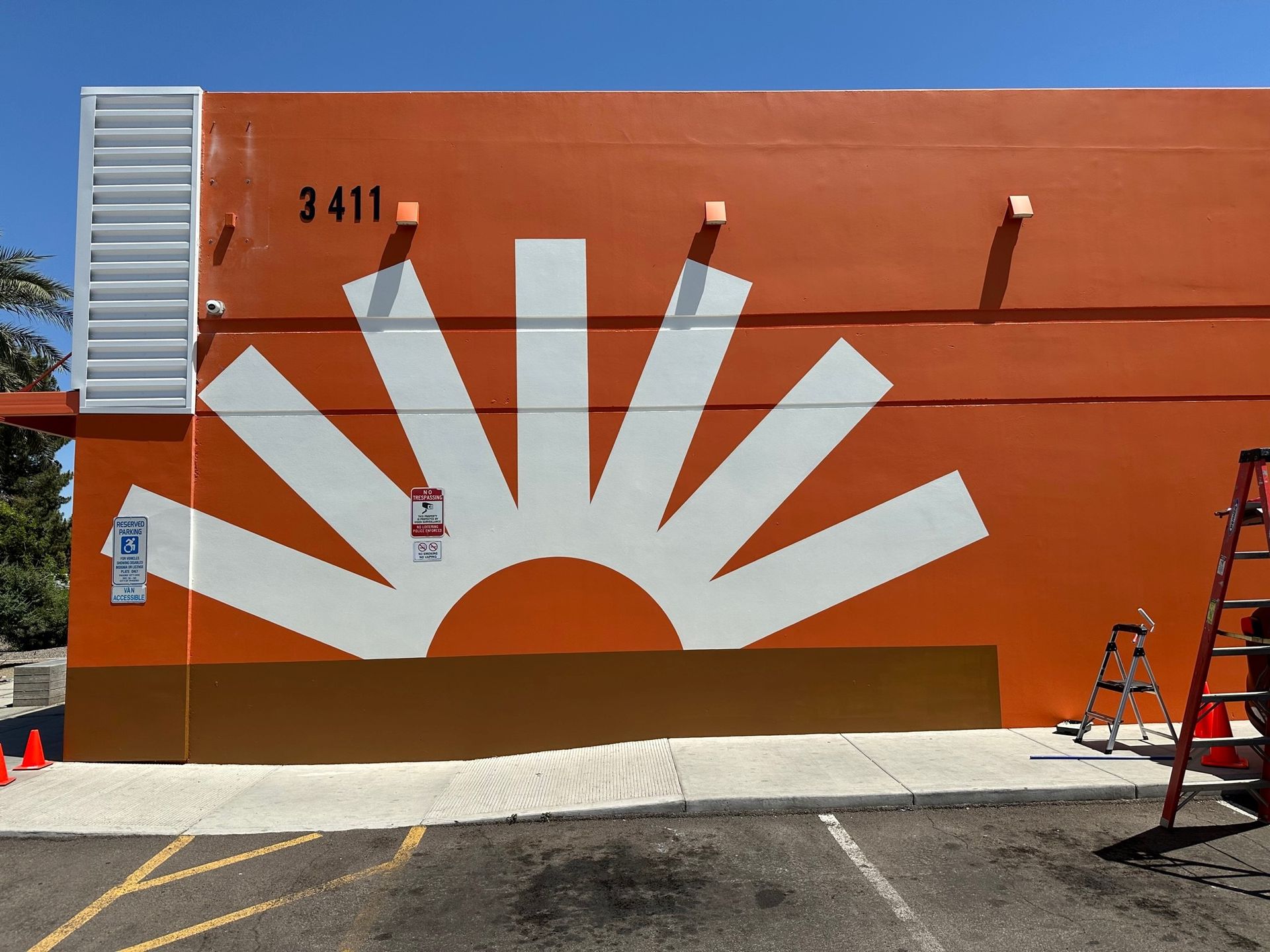 A building with the number 3411 painted on it