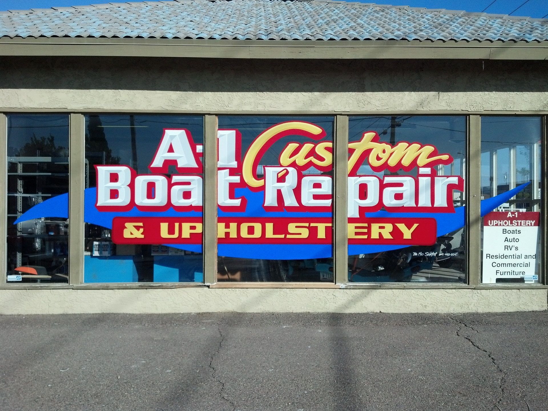 A custom boat repair and upholstery store front