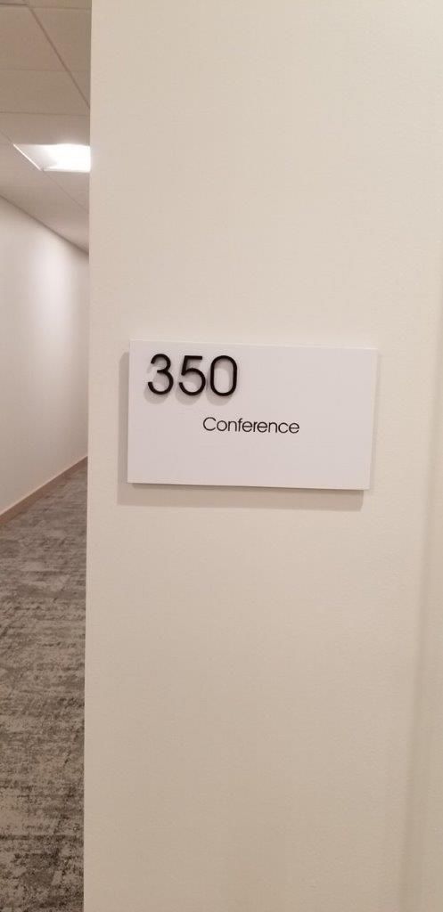 There is a sign on the wall that says 350 on it.