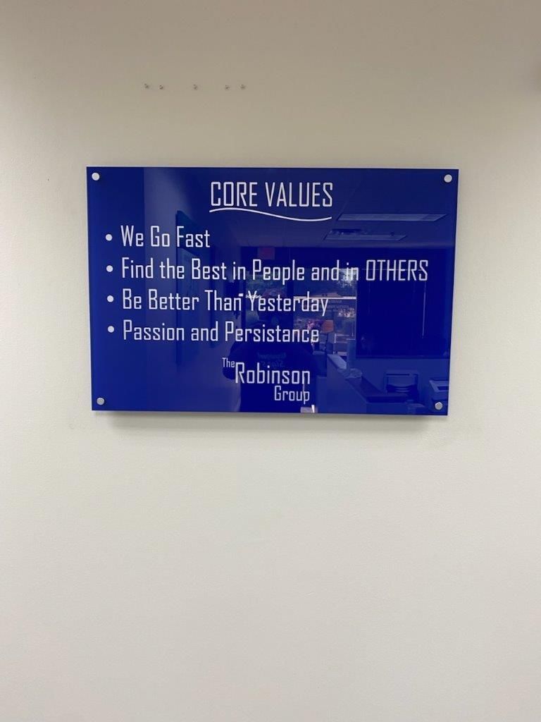 A blue sign that says core values on it