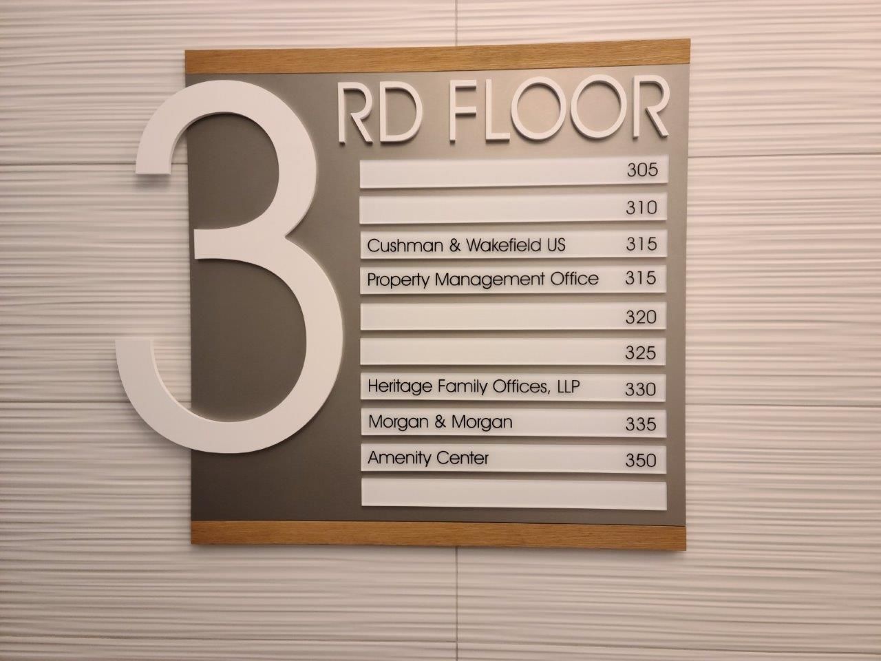 A sign for the 3rd floor of a building