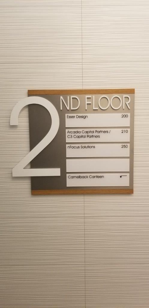A sign for the second floor of a building.
