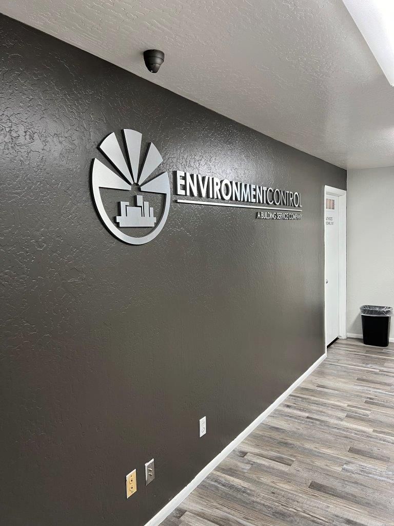 A hallway with a sign on the wall.