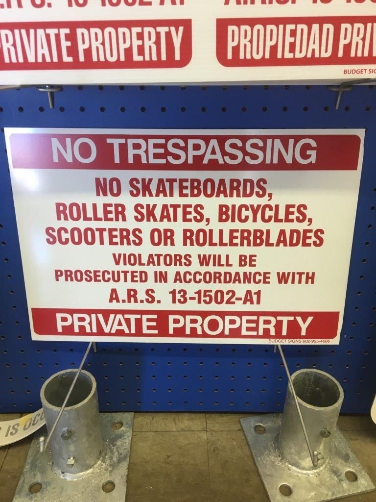A sign that says no trespassing on it