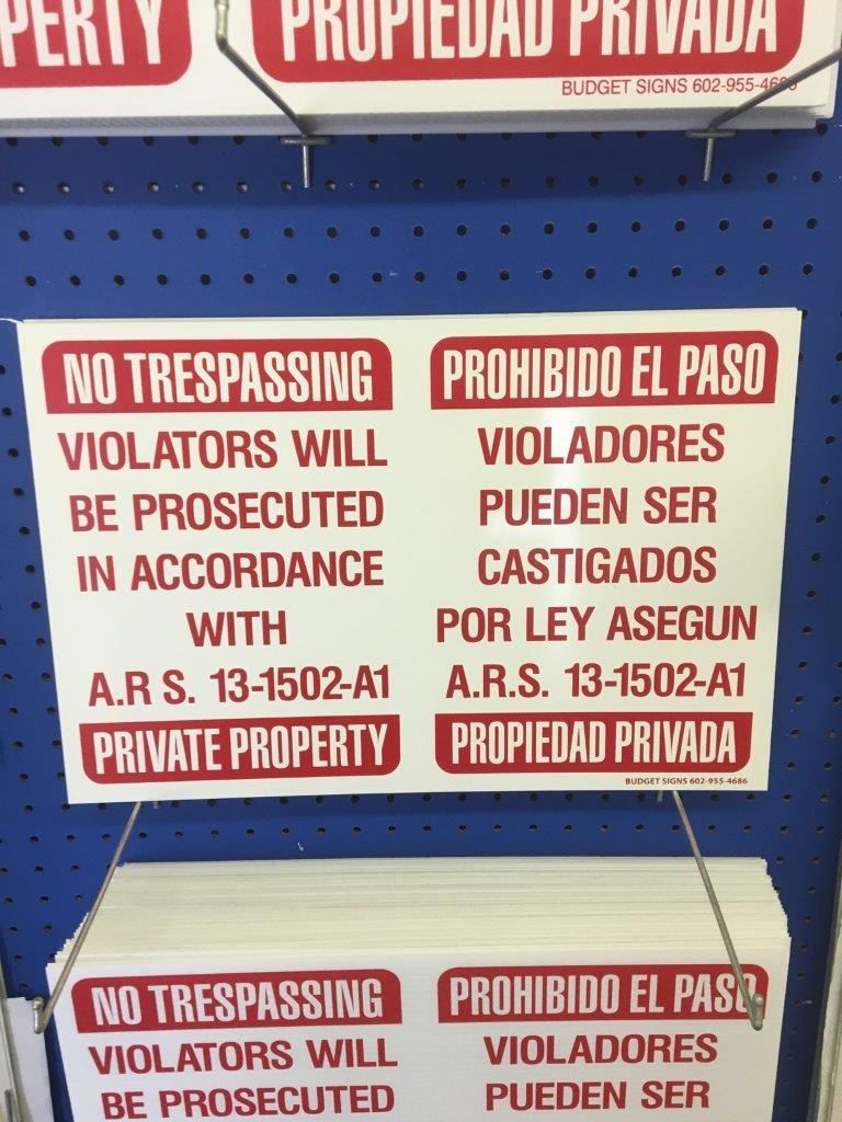 In-stock signs in Spanish and English