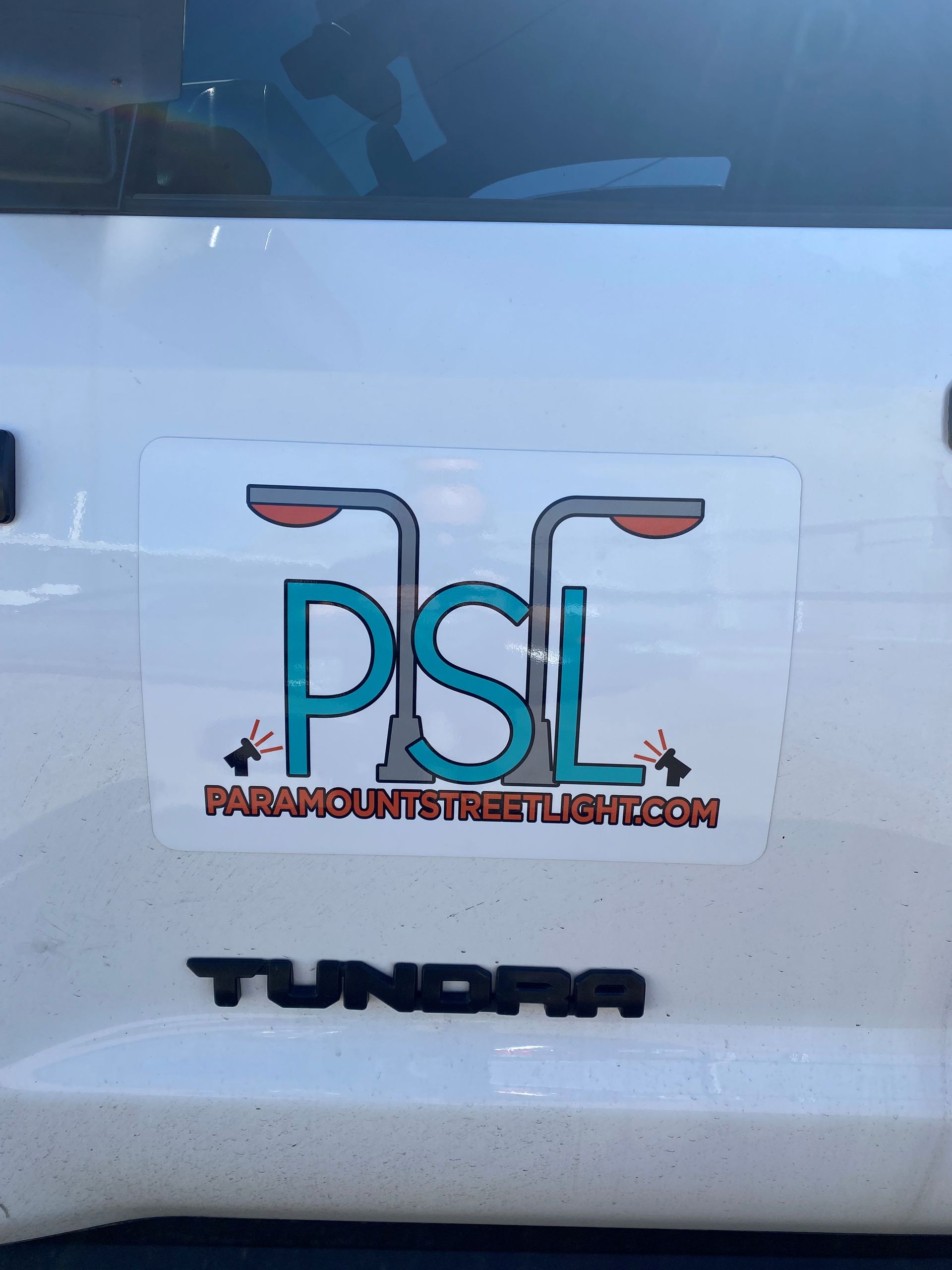 A white tundra with a psc sticker on it
