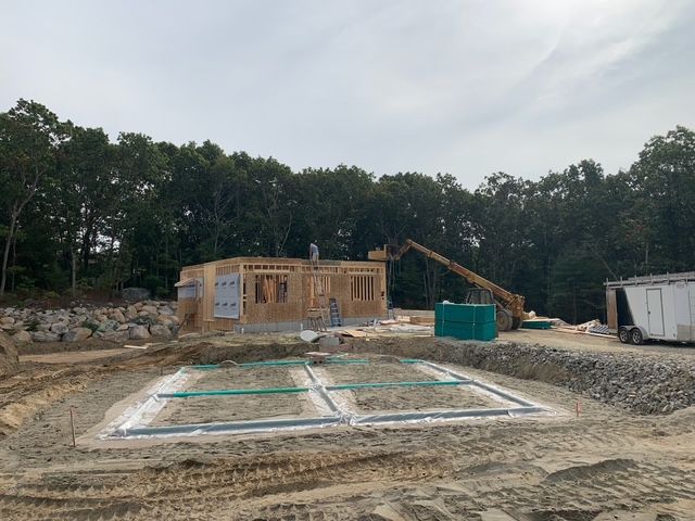 The trenches dug in the ground are for laying the water lines