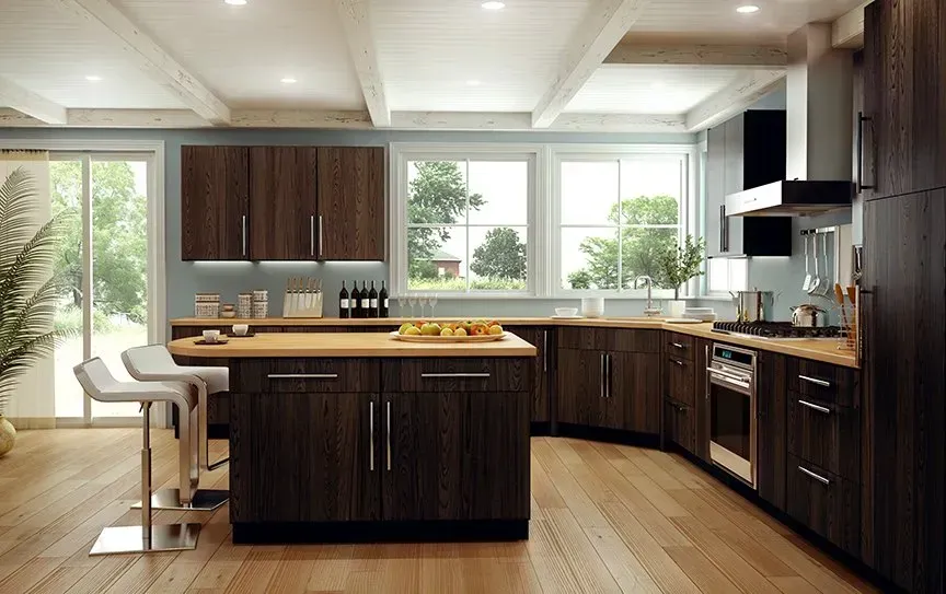 Modern kitchen with dark wood cabinets, island, and light wood floors.