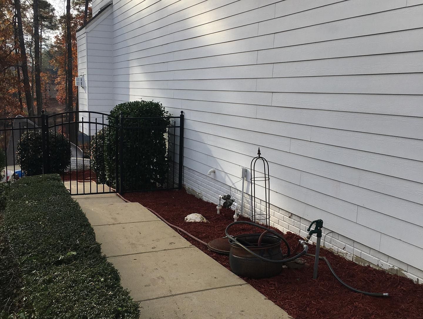 A white house with a walkway leading to it