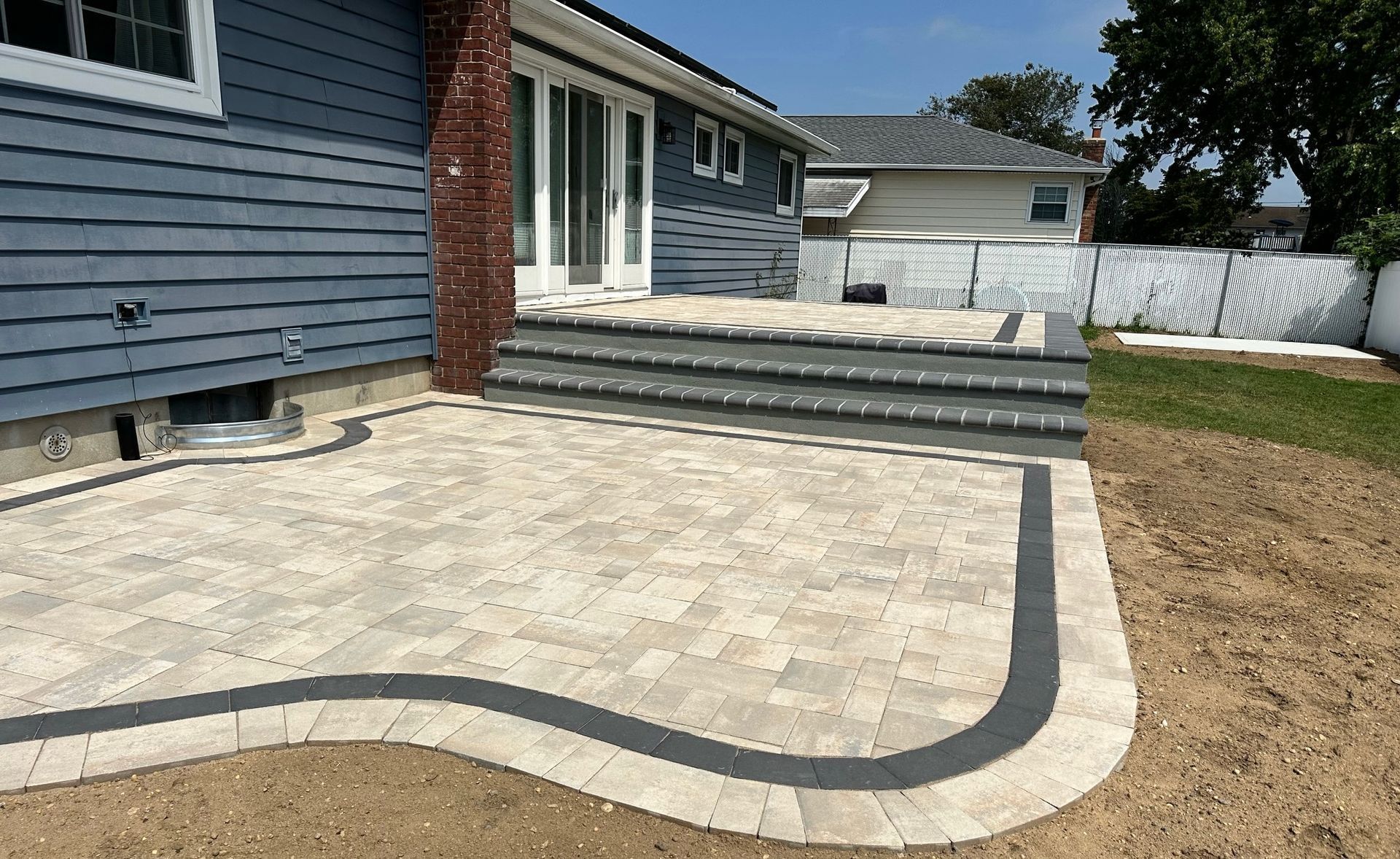 A brick patio black border