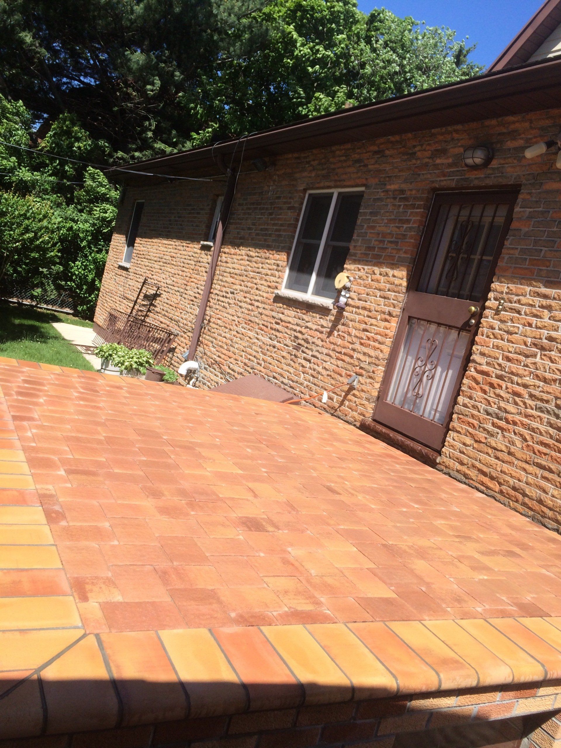 Brick patio with red pattern