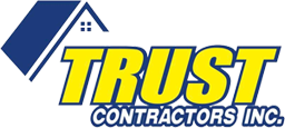 Logo for Trust Contractors Inc. featuring the yellow text "TRUST" under a blue roof icon, with "CONTRACTORS INC." below.