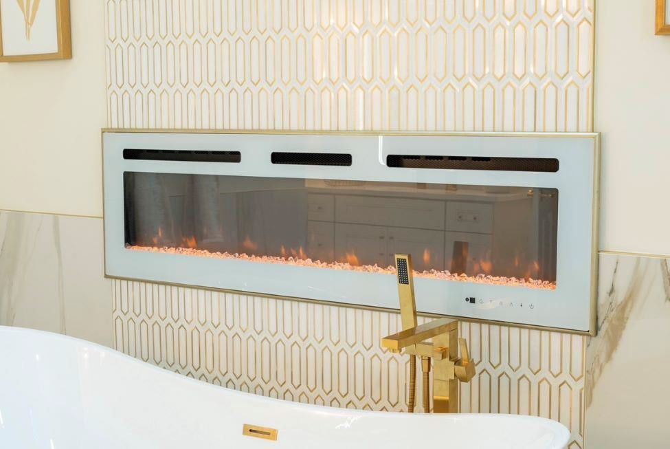 A bathroom with a fireplace and a bathtub