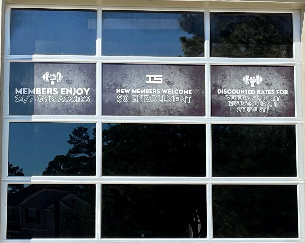 A garage door with a sign that says members enjoy
