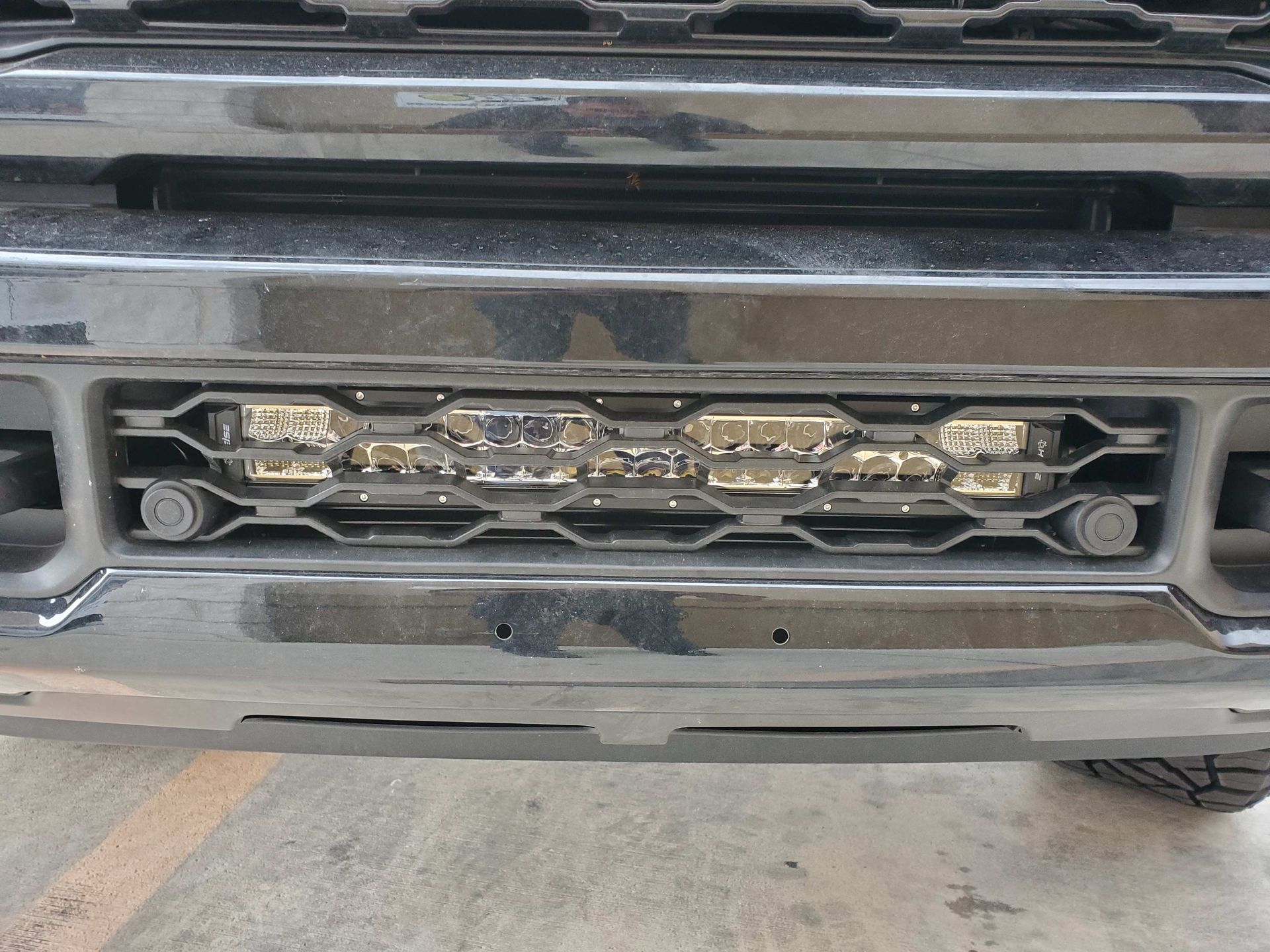 a close up of the front grille of a truck .