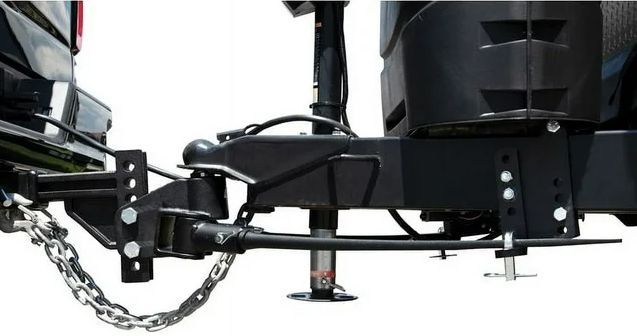 Weight distribution hitch attached to vehicle