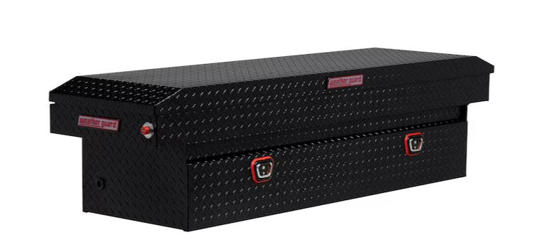 a black toolbox is sitting on a white surface