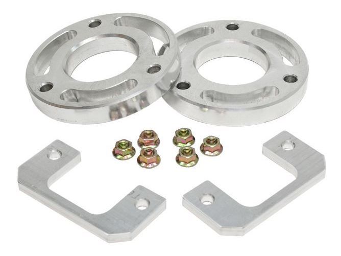 a set of aluminum spacers and nuts on a white background