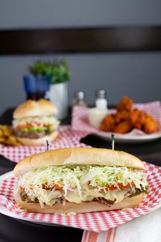 Lasagna, burger, and subs