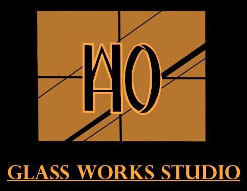 Logo for HO Glass Works Studio in orange and black, with stylized cracked-glass design
