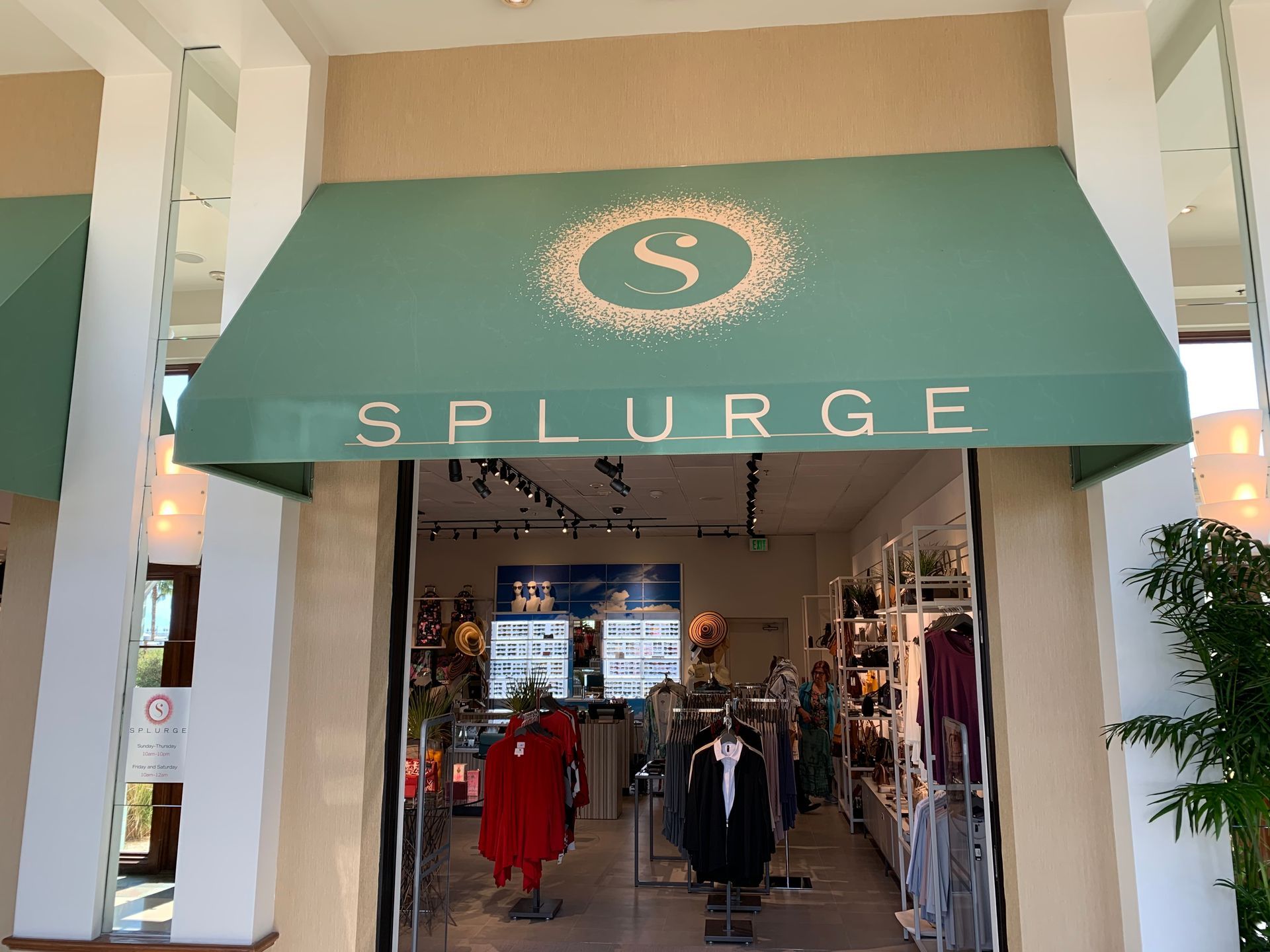 Green awning for Splurge store entrance.