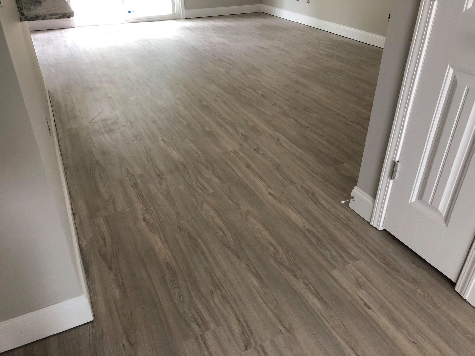 Luxury Vinyl Plank Floor Installation - Before - After