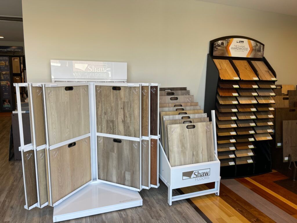 There are many different types of wood flooring on display in this room.
