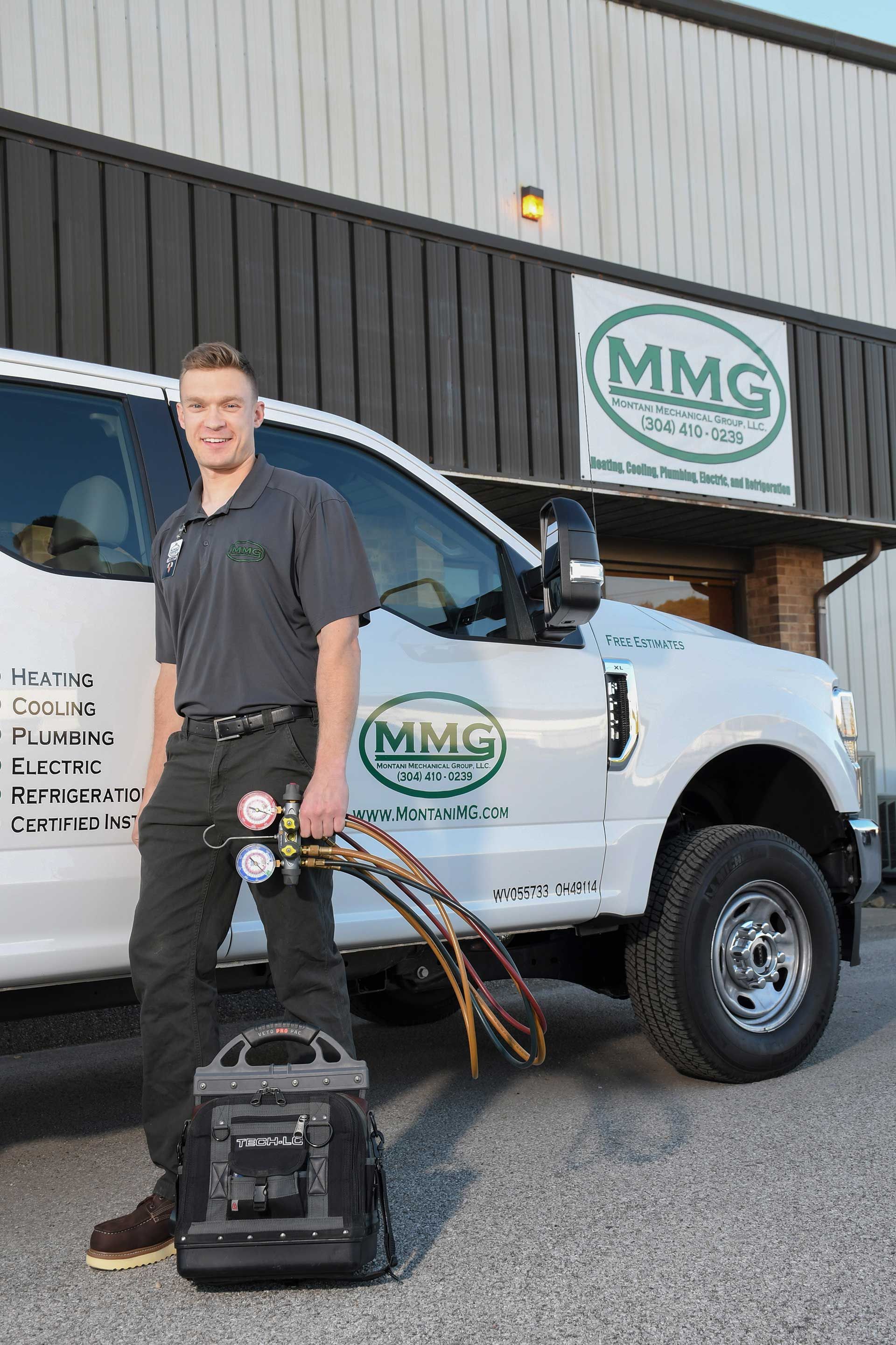 man standing by the service van