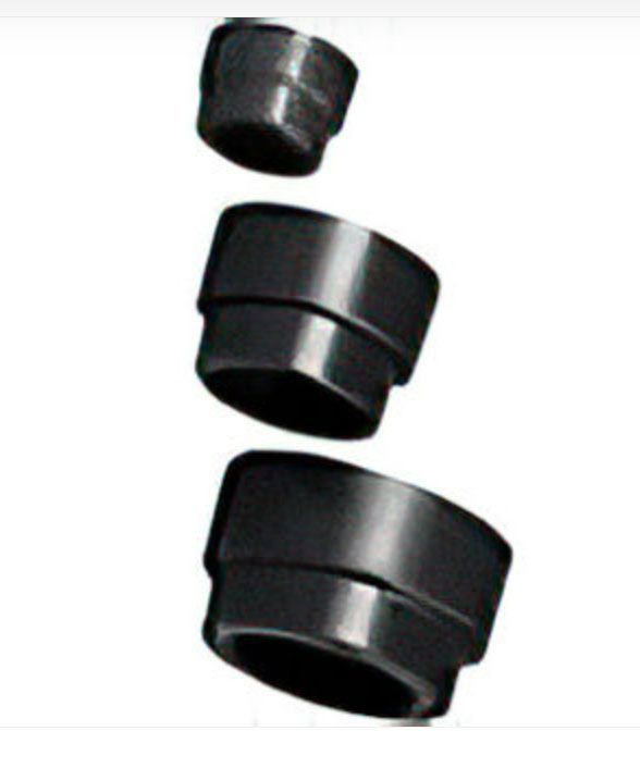 Three black cylindrical caps arranged vertically, smallest at top and largest at bottom.