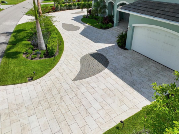 An aerial view of a driveway leading to a house.